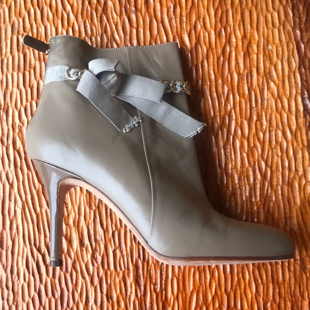 Kate Spade taupe high heeled booties.
